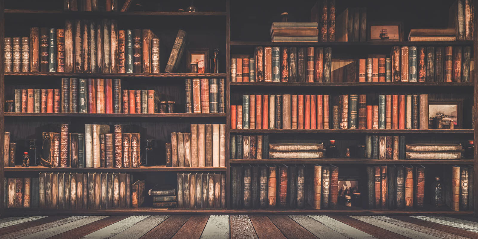 blurred bookshelf Many old books in a book shop or library